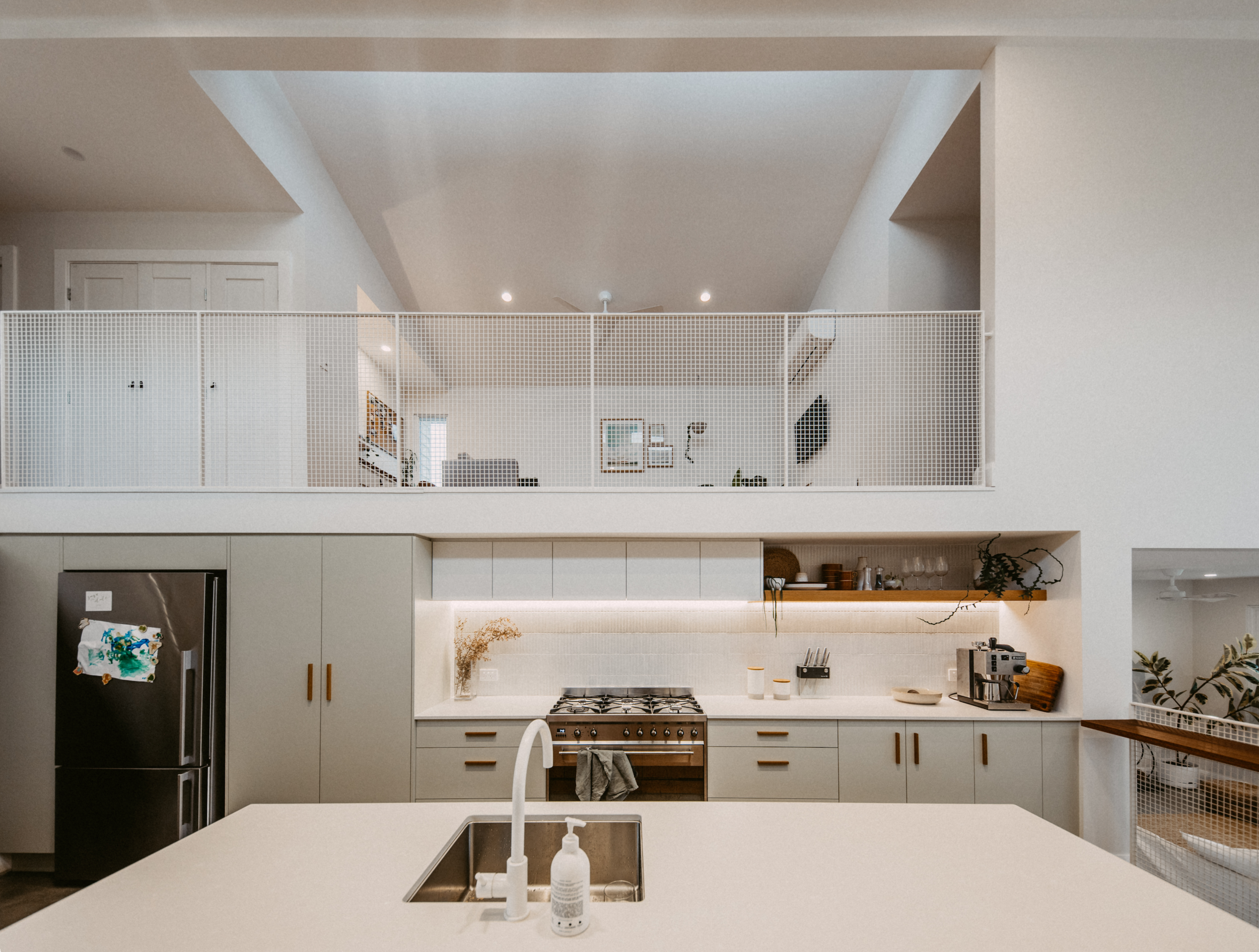 White kitchen with recessed ceiling detail